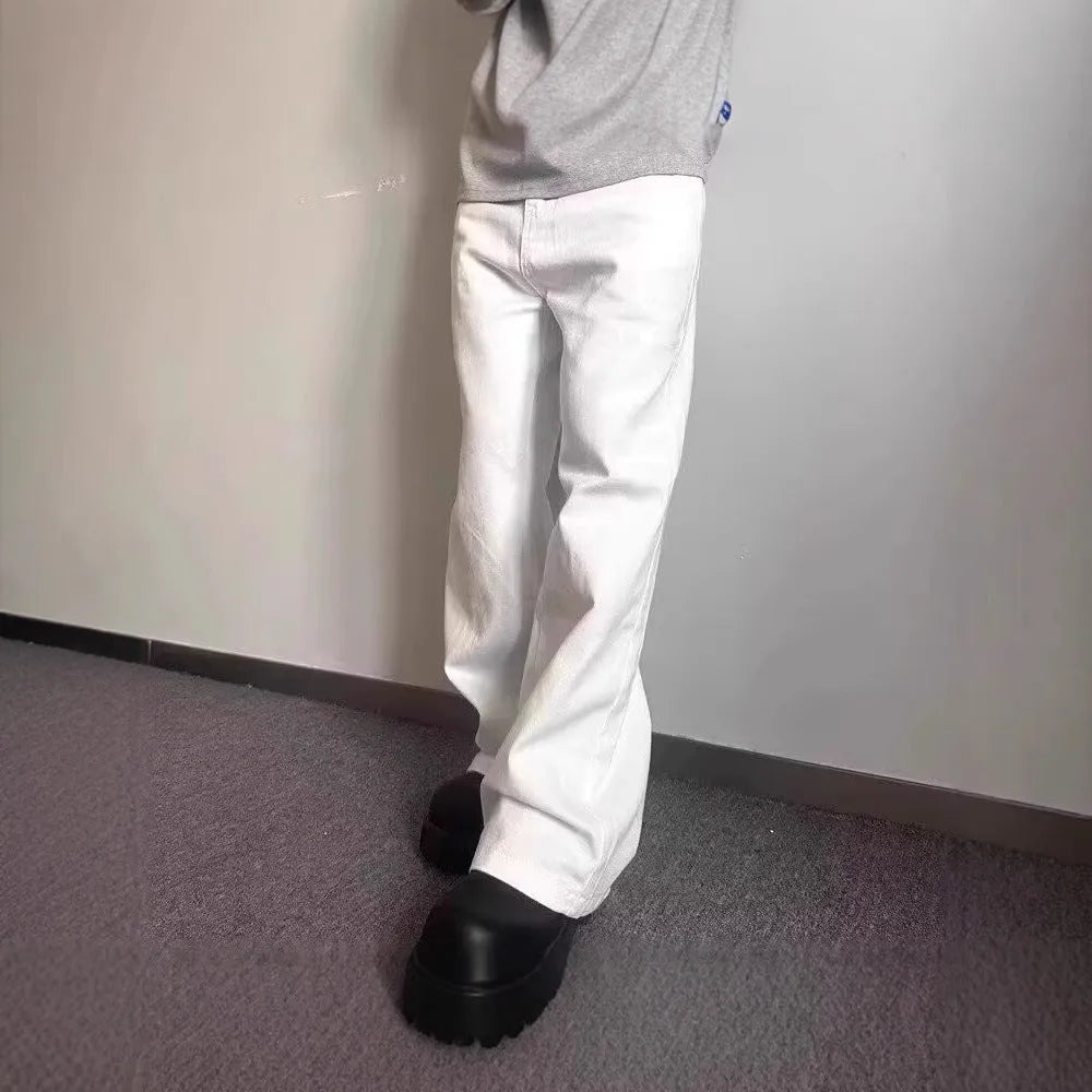 Men's white straight-leg cotton jeans with a mid-rise waist and zipper fly