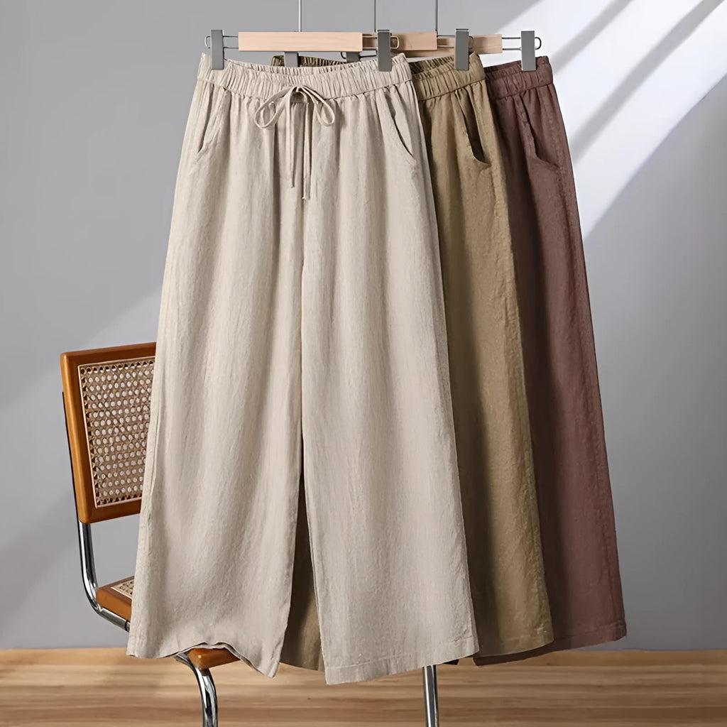 Women's straight-leg casual trousers with elastic waistband and lace-up drawstring detail in four colour options