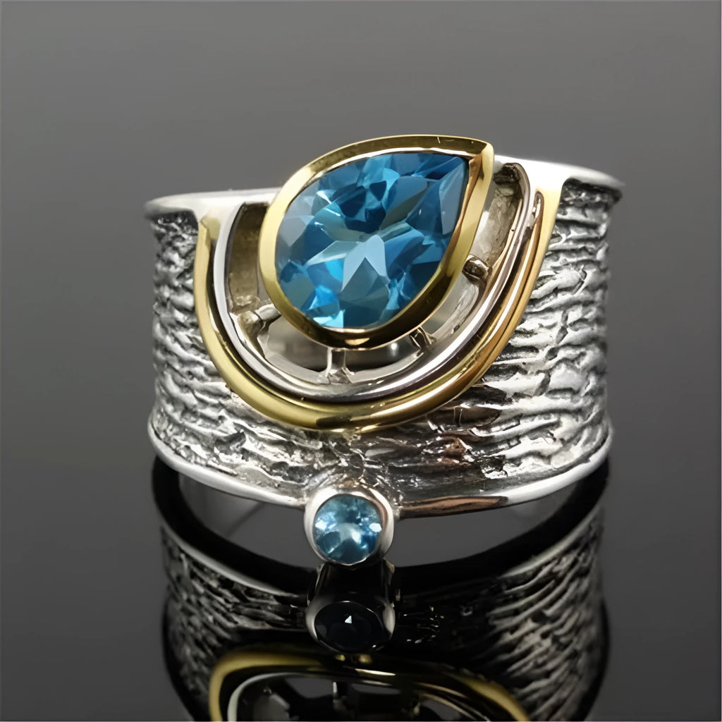 Chinese style women's blue rhinestone zircon ring with drop shape design on alloy band