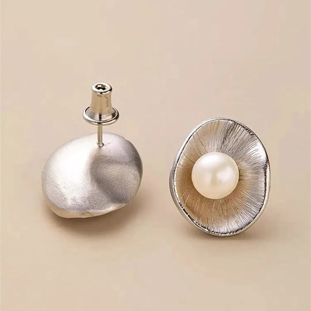 Gold coloured geometric pearl sterling silver needle ear studs for women.