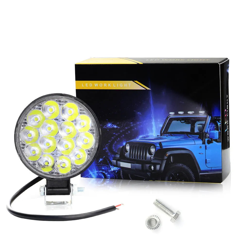 White LED work lights with round aluminum housing for car and vehicle auxiliary lighting