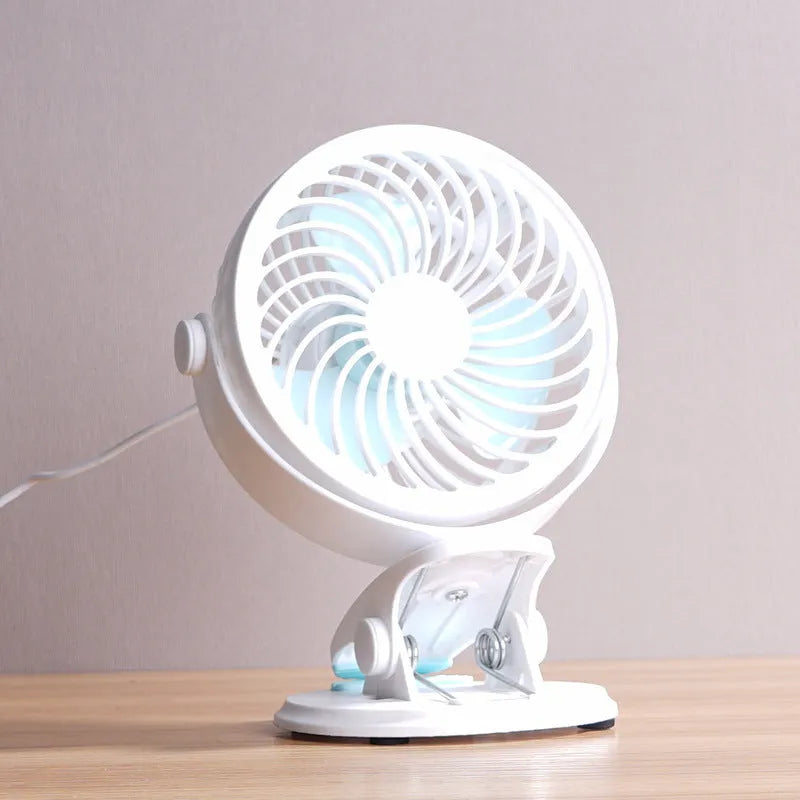 USB-powered portable desk fan with clip-on and floor-standing options showing compact 19×15×10cm dimensions