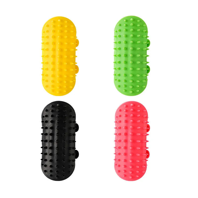 Silicone cat grooming comb with adjustable strap attached to table leg for hair removal and scratching relief