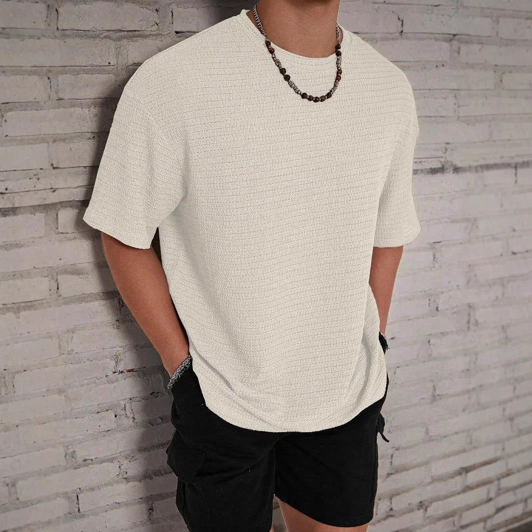 Men's slim fit hollow design t-shirt in lightweight polyester available in four solid colours