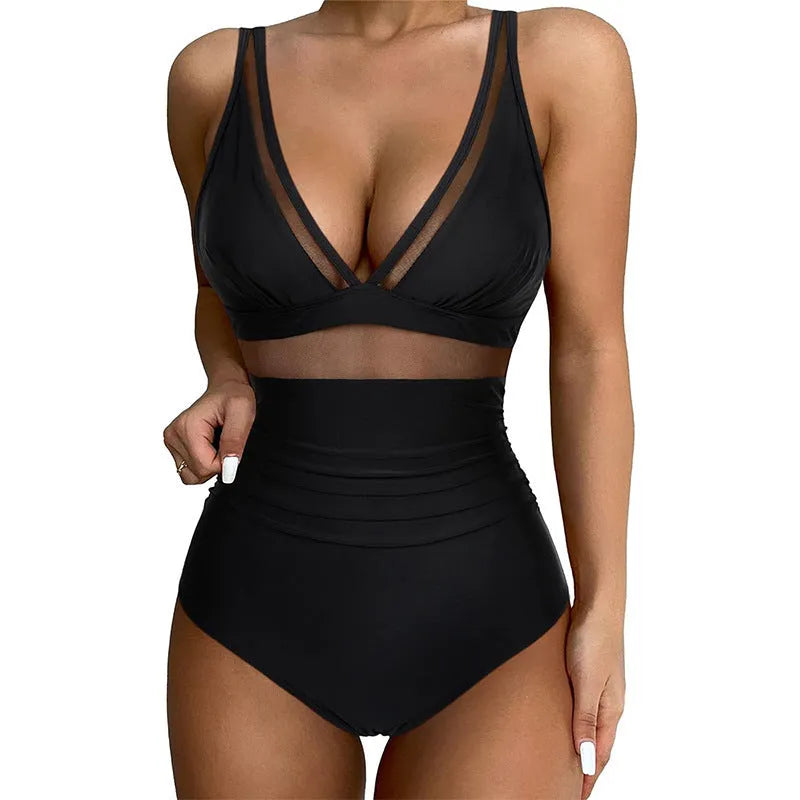 Black women's one-piece halter swimsuit with mesh detailing and briefs styling