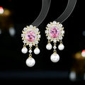 Oval geometric earrings with zircon inlay and pearl tassels in light purple colour