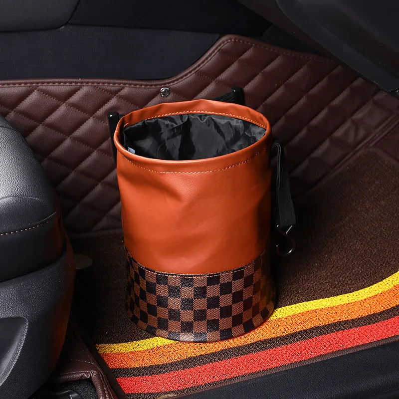 A leather interior car trash can shown in a folded and unfolded state.