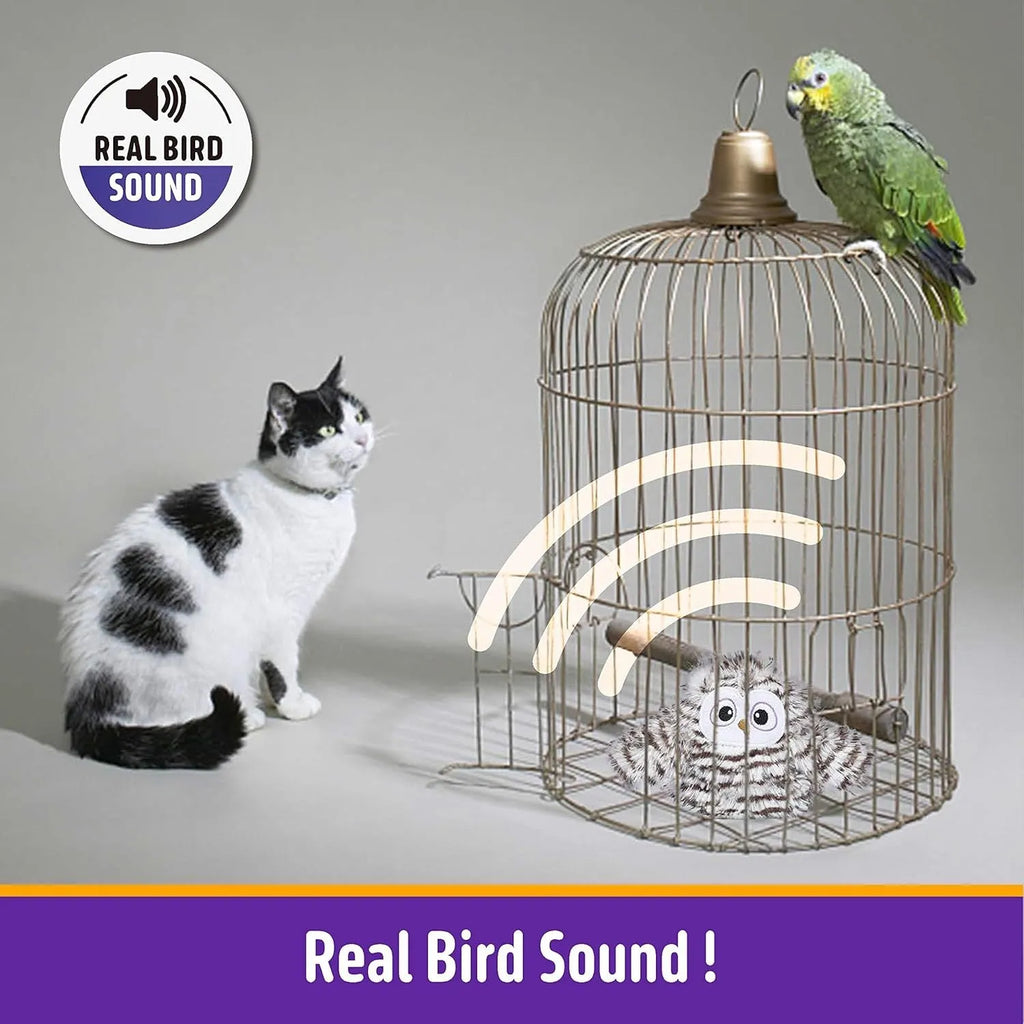 Grey interactive owl cat toy with flapping wings on flat surface