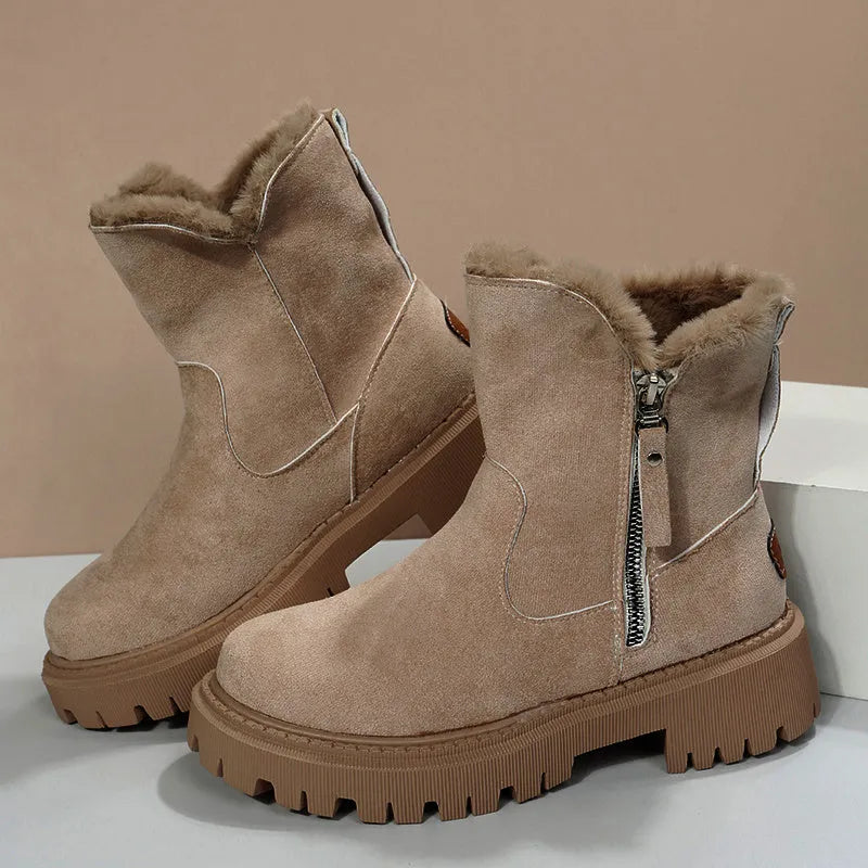 Women's black faux suede high-top snow boots with side zip and non-slip rubber sole.