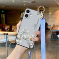 Retro Pipa flower-bird TPU iPhone case in black woven blue floral or magnolia print