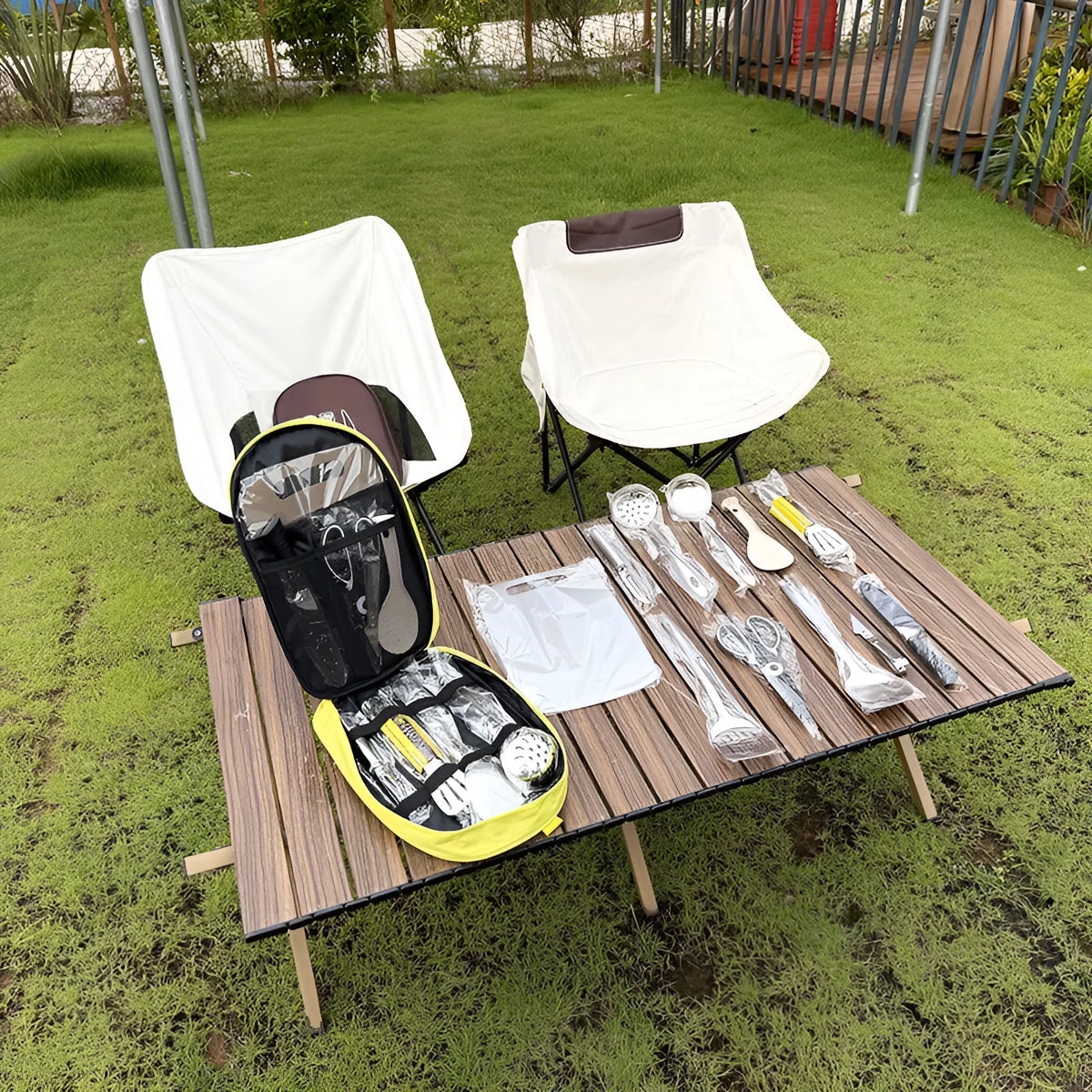12-piece stainless steel picnic cutlery set inside a khaki portable storage bag.