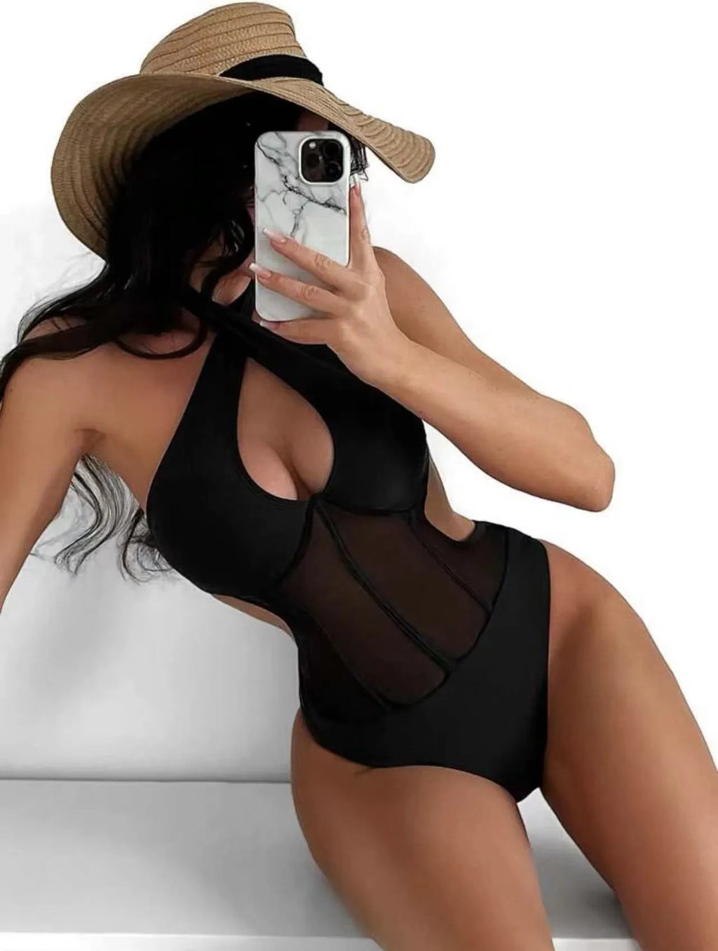 Women's black spun yarn one-piece swimsuit bikini on a mannequin