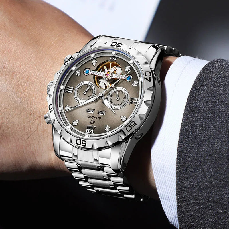 Automatic mechanical watch for men with stainless steel strap on wrist, showing metal case and watch face.