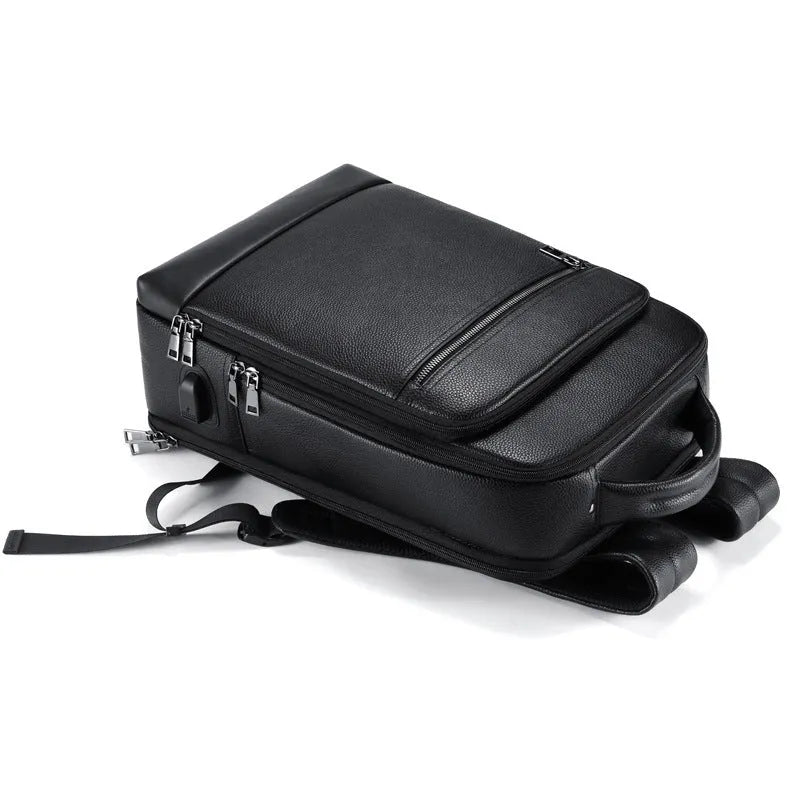 Black leather men's business computer backpack with curved shoulder straps and below 20L capacity