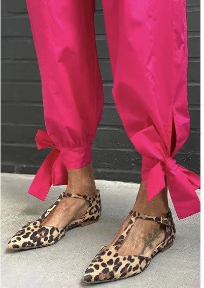Women's leopard print pointed toe pumps with cross shoulder straps and chunky low heel