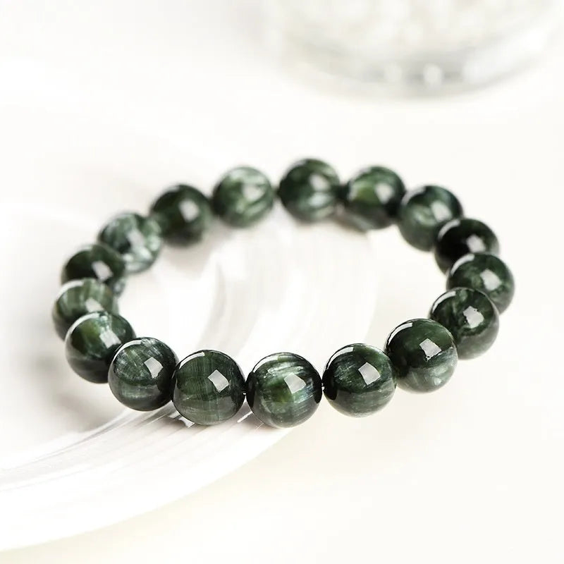 Green Dragon crystal bracelet with 8-9mm round beads showing Ruyi symbolism elements