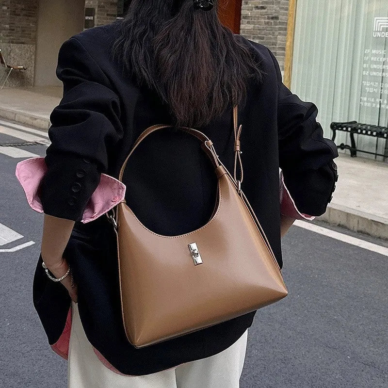 Genuine leather dumpling-shaped crossbody shoulder bag with change pocket and mobile phone compartment