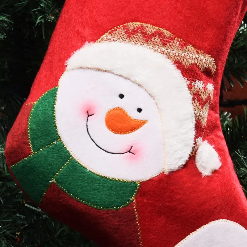 Non-woven fabric Christmas sock decorations in elk, elderly gentleman and snowman designs with hanging ribbon