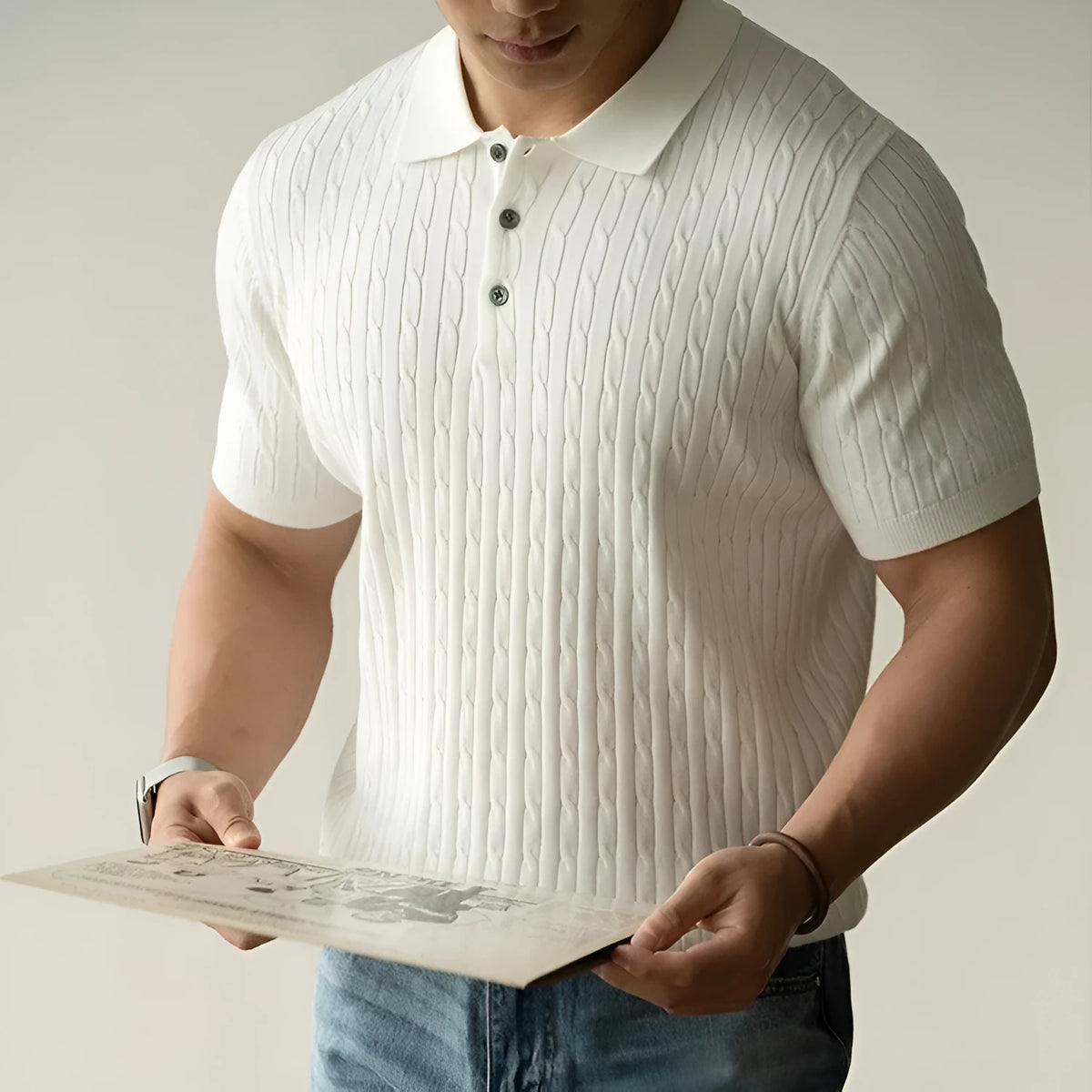 Men's khaki short sleeve business casual top laid flat, showing collar and sleeve detail.