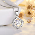 Silver love heart necklace with crown and bow details on clavicle-length chain