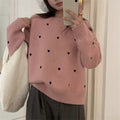 Women's loose fit crew neck acrylic sweater with embroidery detail in milky white colour