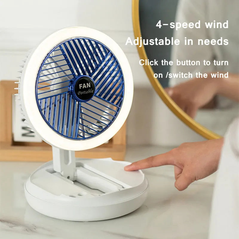 Blue foldable table fan with LED light showing 300° rotation angle and pen holder design