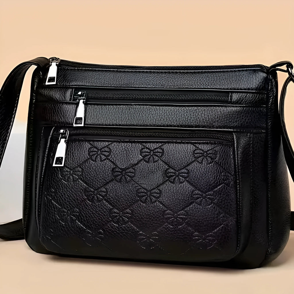 Butterfly black women's crossbody messenger bag with embossing details and mobile phone compartment