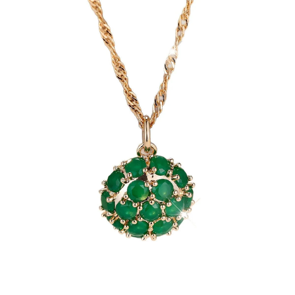 Geometric pendant necklace with round emerald diamond centrepiece on adjustable chain