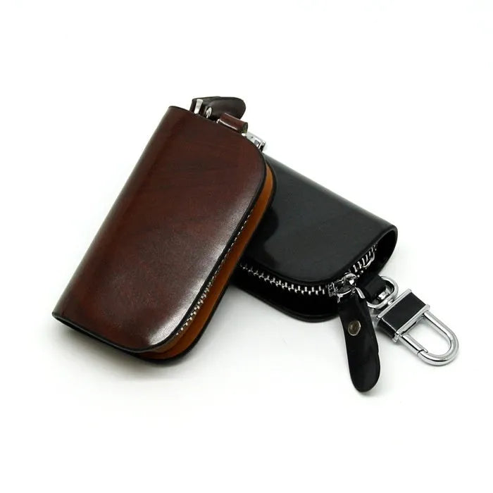 V-shaped genuine leather car key case with frosted finish showing black and brown colour options