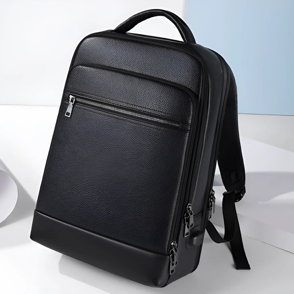 Black leather men's business computer backpack with curved shoulder straps and below 20L capacity