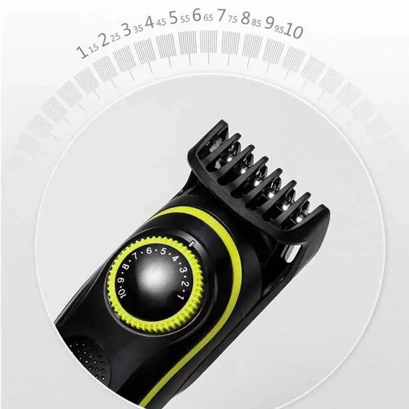 Black KM-696 rechargeable electric hair clipper with stainless steel blades and cleaning brush.