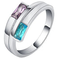Copper zircon ring with electroplated silver finish showing stone inlays and metallic band