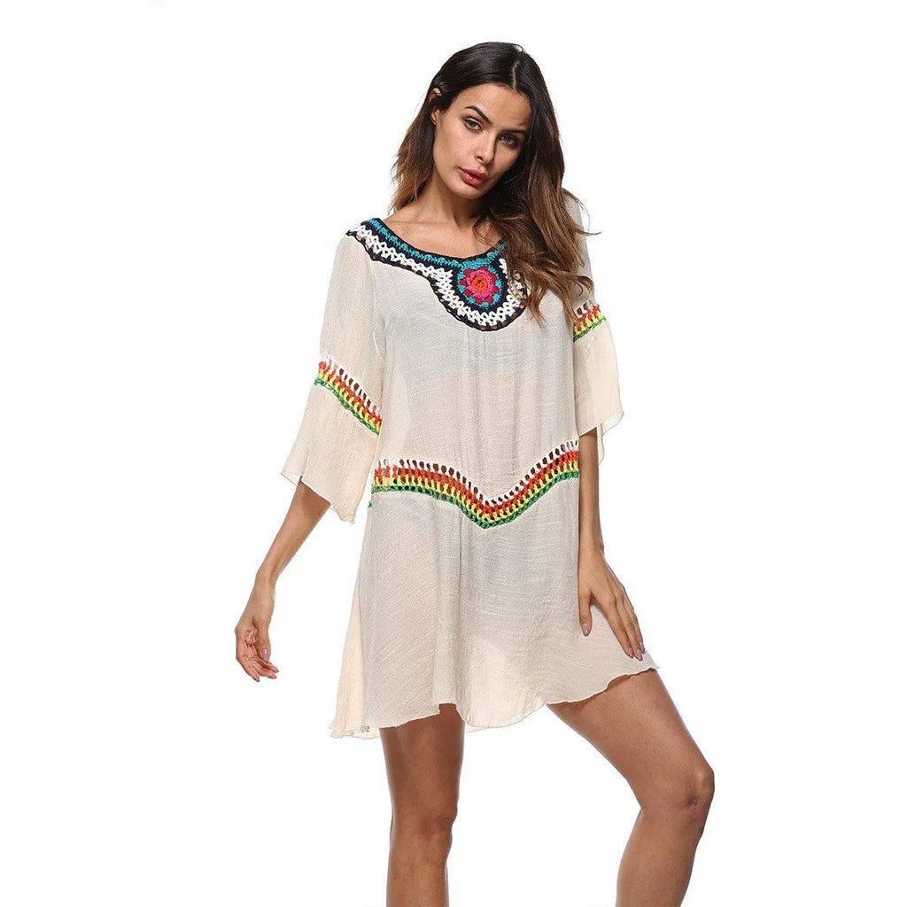 Crocheted ethnic style women's beach cover-up in acrylic fabric for sun protection.