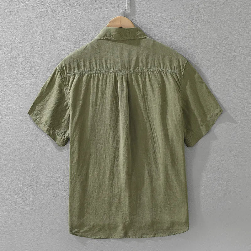 Loose fit short sleeve lyocell cardigan top in black, green, or purple.