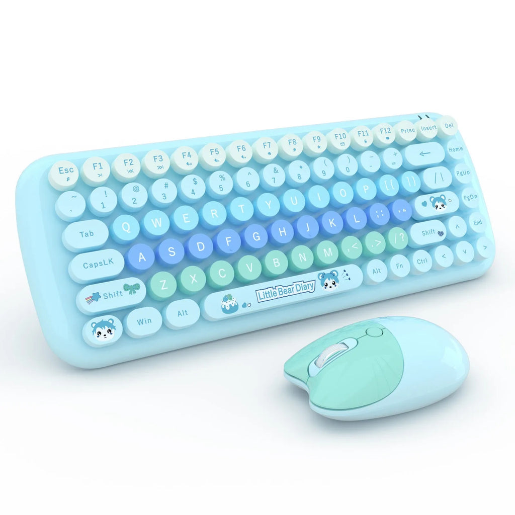 Candy pink mini wireless keyboard and mouse set with USB receiver on a desk.