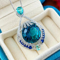 Blue crystal geometric pendant necklace with water wave chain for women's office wear