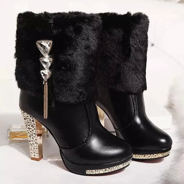 Women's black ankle boots with a chunky high heel, made from artificial PU material.