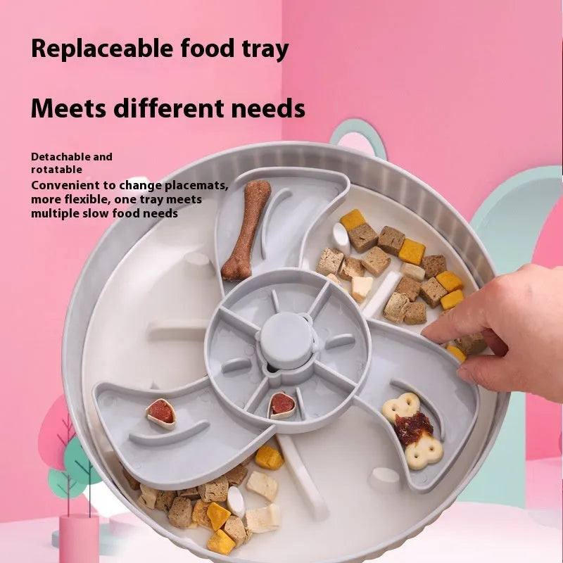 Rotating pet slow feeder bowl with a blue windmill-pattern silicone licking mat inserted.
