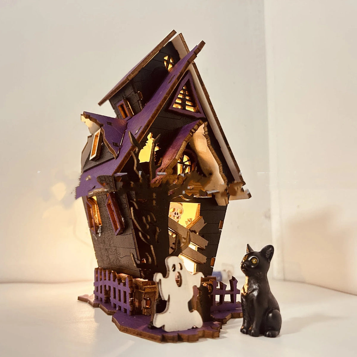 Wooden haunted house Halloween table decoration with luminous finish