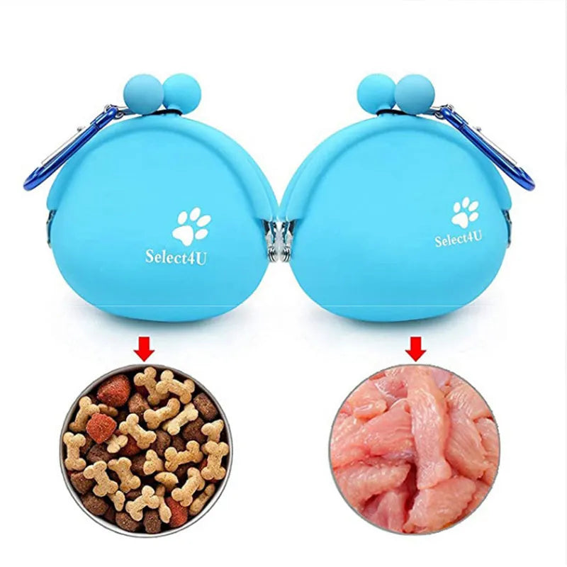 Blue silicone dog treat pouch with hook and loop closure, shown attached to a waistband.