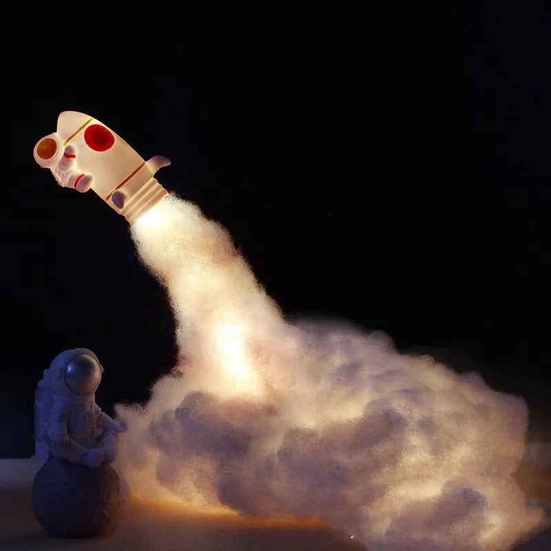 Astronaut rocket night light DIY kit components with LED string lights and rocket model