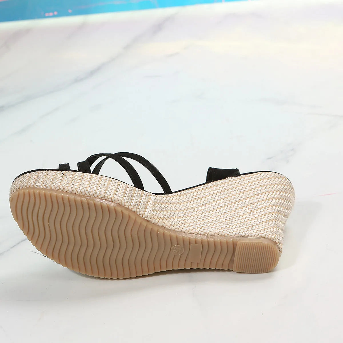 Women's wedge sandals with fish mouth toe opening and cloth upper in black colour