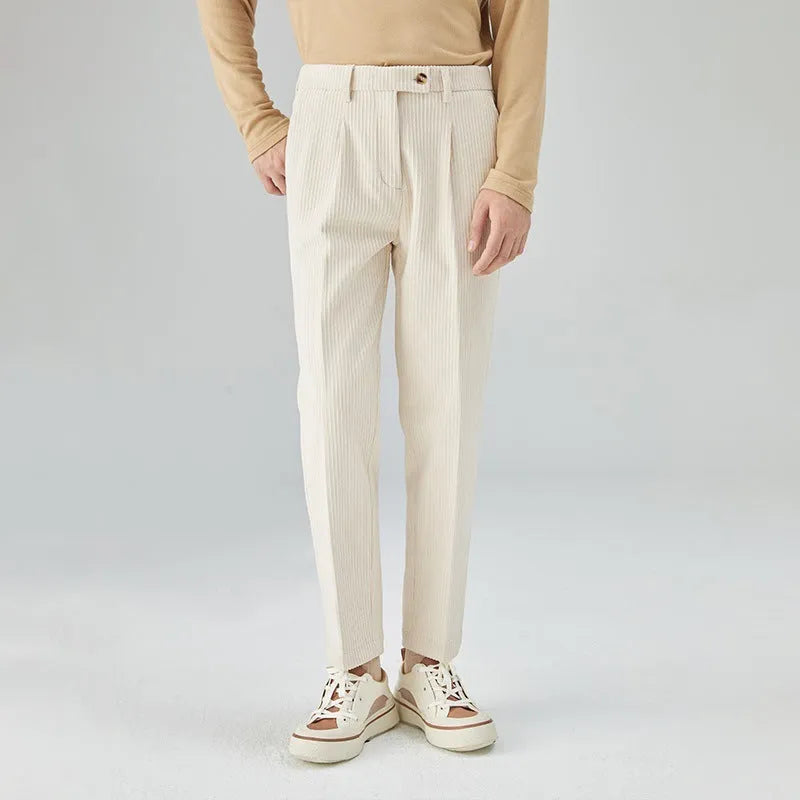 Corduroy straight-leg men's trousers in beige colour showing texture detail