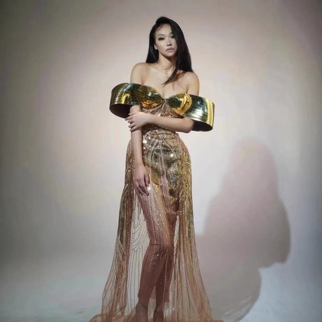 Gold strapless sequined evening dress with tulle skirt and high split detail