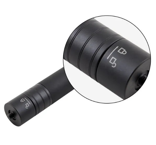 Black retractable aluminium selfie stick extended with smartphone attached and remote shutter in hand.