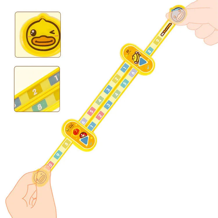 Yellow plastic digital decomposition ruler for children, 24.5 cm long.