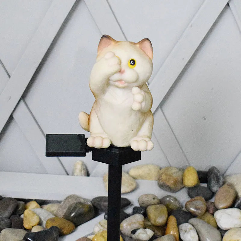 Brown cat-shaped solar lawn light for garden pathway illumination with weather-resistant resin construction