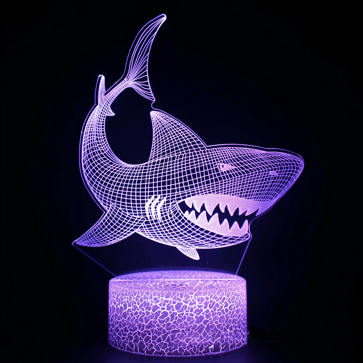 Shark-shaped 3D LED table lamp with colourful lighting on 85x85x37mm black ABS base