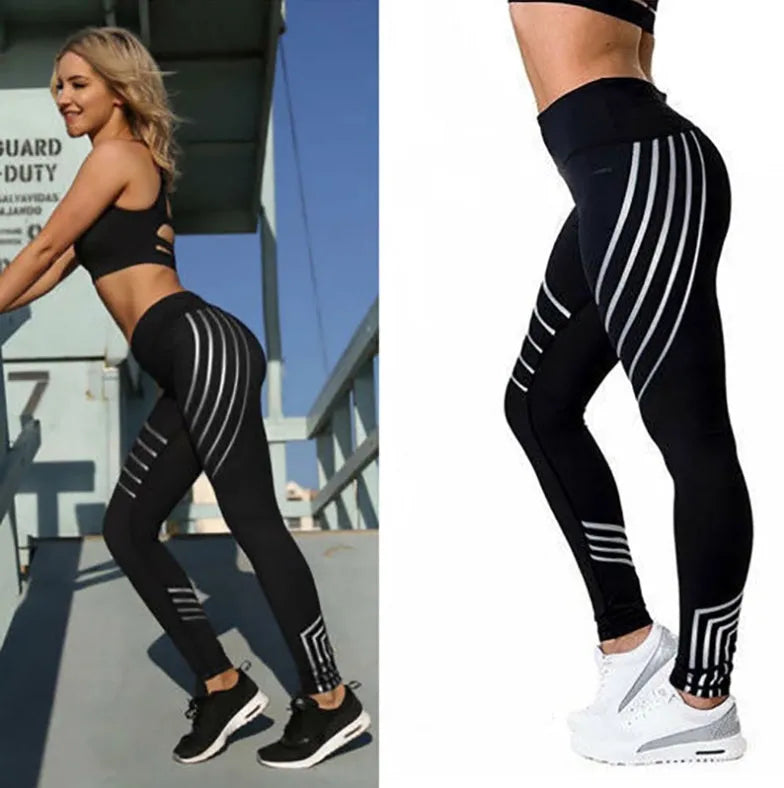 Women's black workout leggings with a glowing print, shown in a slim-fit pencil pants style.