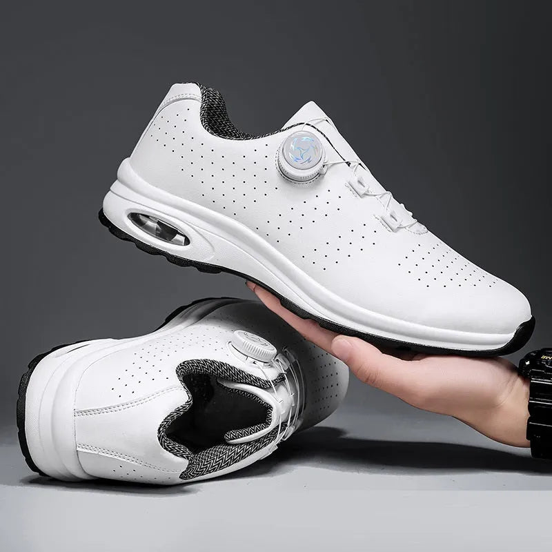 Men's black low-top casual shoes with mesh upper and white laces on a flat composite sole.